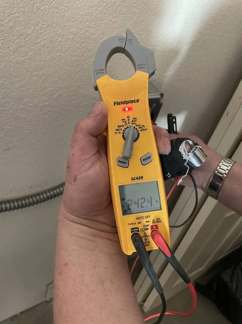 Voltage testing with clamp meter during Outlet Installation in Butte-Silver Bow